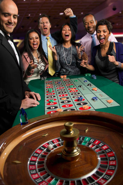 European roulette low-minimum table Roulette wheel with ball in motion